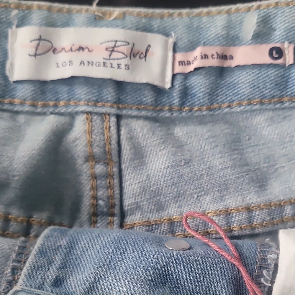 Light Blue Distressed Denim Shorts - Picture 10 of 16